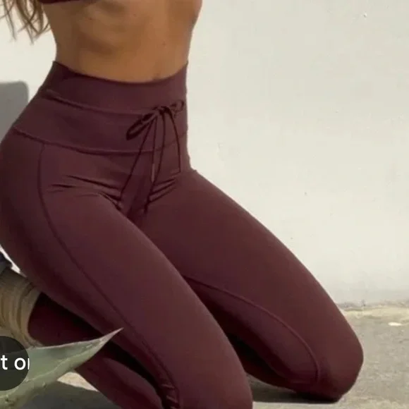 Vuori Women's Burgundy Leggings - Picture 1 of 5